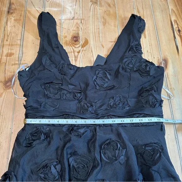 Exceptional Entrance Black Sleeveless Tiered Rosette Midi Dress - Picture 2 of 9